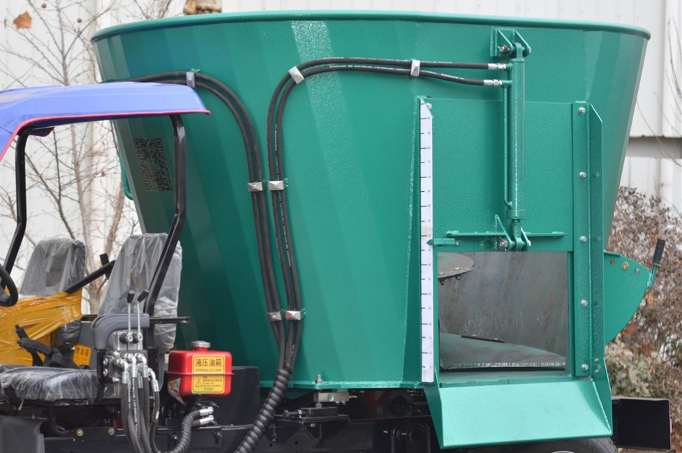 Hydraulically controlled discharge gate.